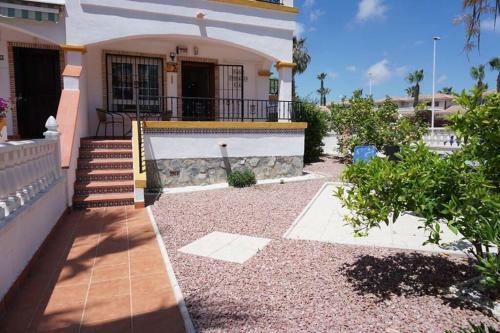 Spacious Ground Floor Apartment With Garden & Communal Pool