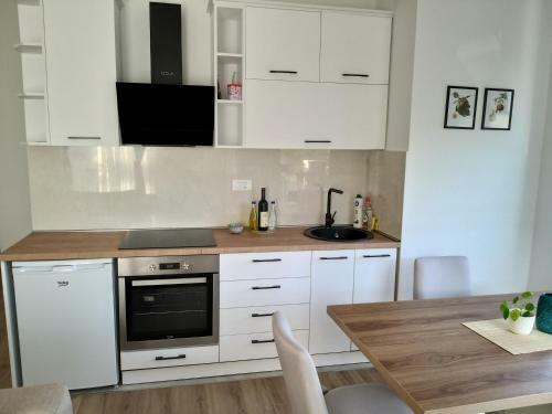 Apartamento Petivat Gardens