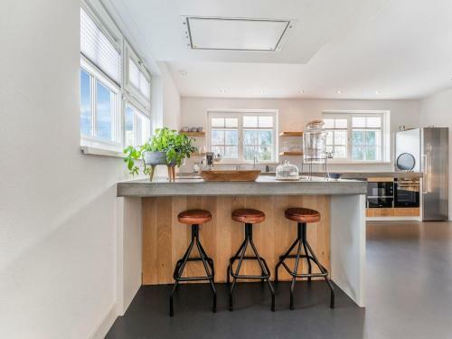 Beautiful Holiday Home In Den Burg With Shared Swimming Pool