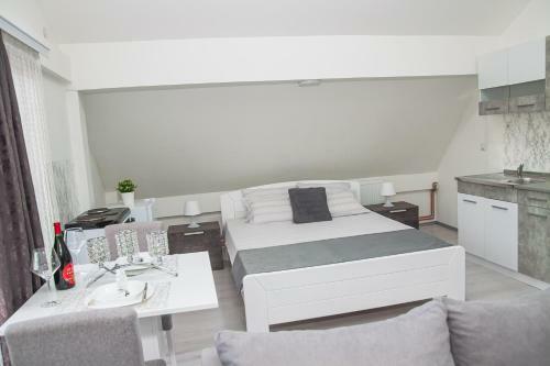 Family Apartmani Le
