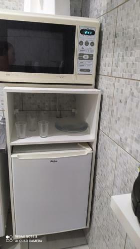 Flat Familiar Com Ar,wi Fi,cozinha E Garagem