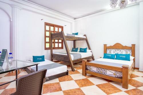 Hostal Ayenda Casa Impacto