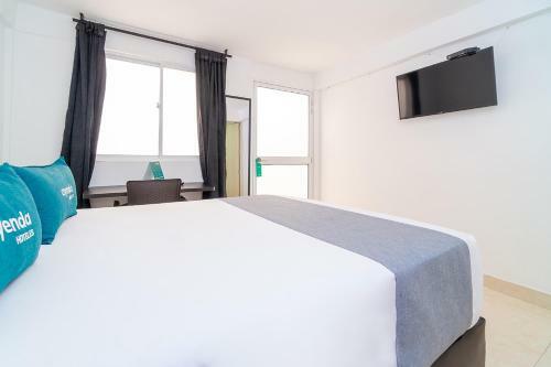 Hotel Ayenda Casa Impacto 66