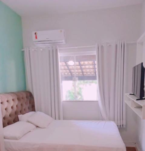 Casa 3 Suites Ar/piscina/churrasqueira
