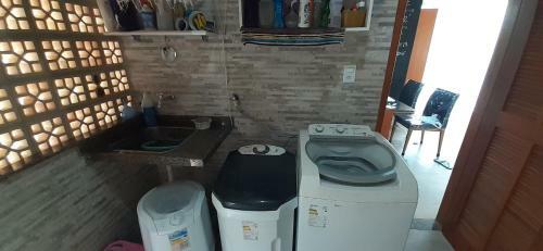 Casa Praiana Em Condominio Com Lazer