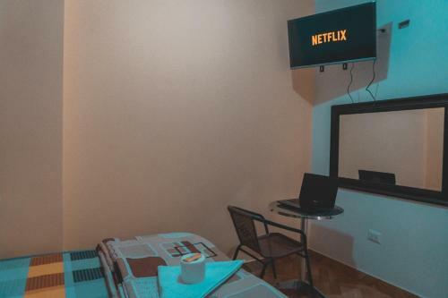 Hostal Tulip�n Rojo