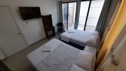 Apartamento Suites Y Habitaciones En Edificaci�n Amaralto