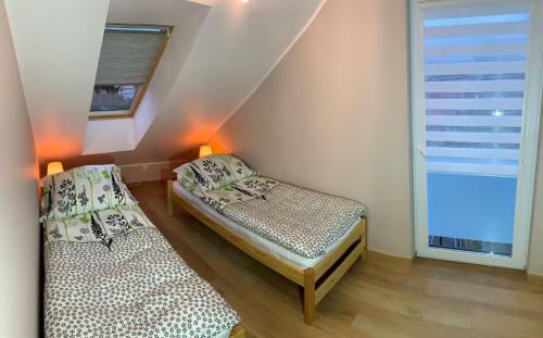 Apartamenty Napiasku Pl