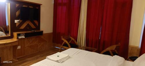 Hotel Takshil