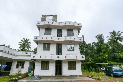 Hotel Spot On 49577 Thozhupaadan Residency