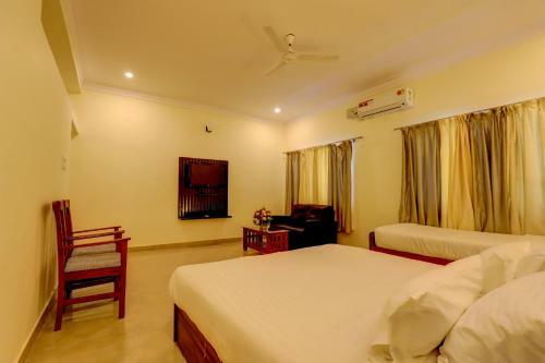 Hotel Ezzenza Royal Garden Brindavan Resort