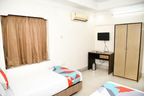 Hostal Crossroads Apartment Hotel
