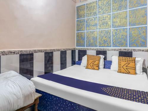 Spot On 79257 New Sado Hotel