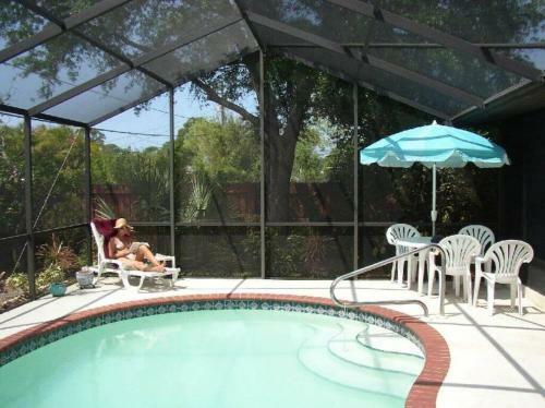 Private Home With Rear Fenced In Yard With Pool