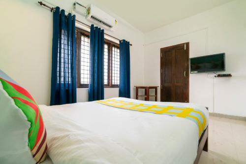 Hostal Oyo 79724 Tharayil Apartments