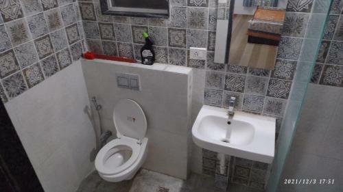 Apartamento Tinsel Home Stay
