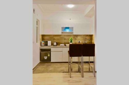 Apartamento The F�ilte Square Near India Expo Mart