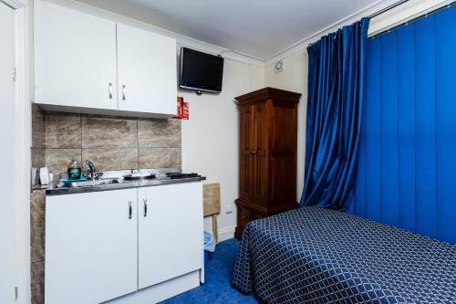 Hostal Luton Hotel Residence