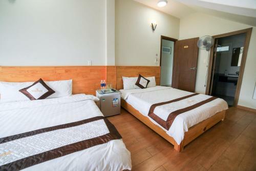 Hotel Kh�ch S?n Quang Minh ?� L?t
