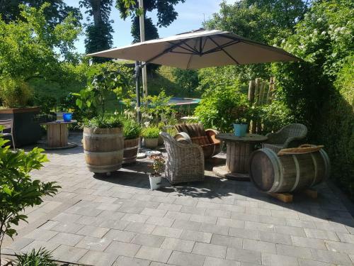 Bed & Breakfast Theetuin Onder De Pannen