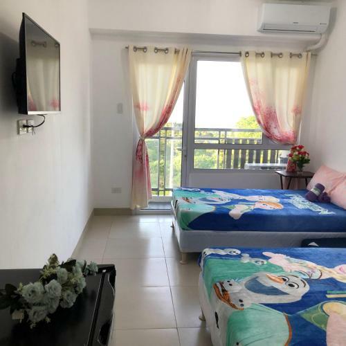 Apartamentos Smdc Wind Suites Jane's Condo