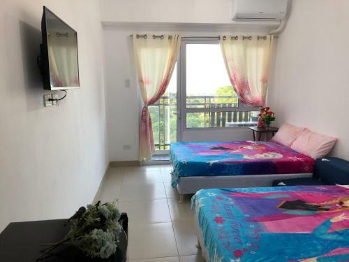 Apartamentos Smdc Wind Suites Jane's Condo