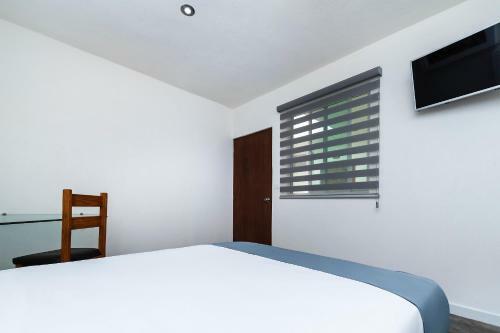 Capital O Hotel Joyma Suites