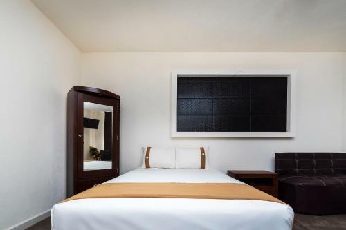 Capital O Hotel Joyma Suites