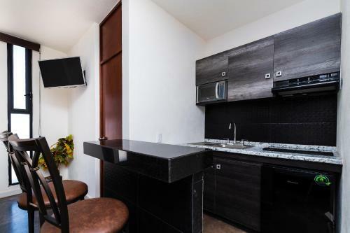 Capital O Hotel Joyma Suites