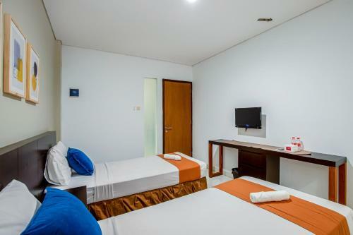 Prime Cailendra Hotel Redpartner