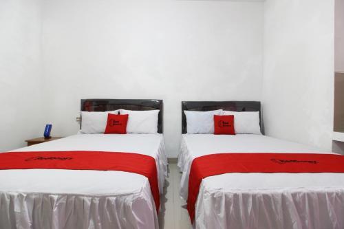 Hostal Reddoorz Syariah At Kebun Raya