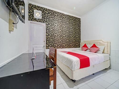 Hotel Oyo 90496 Izzi Ekslusif
