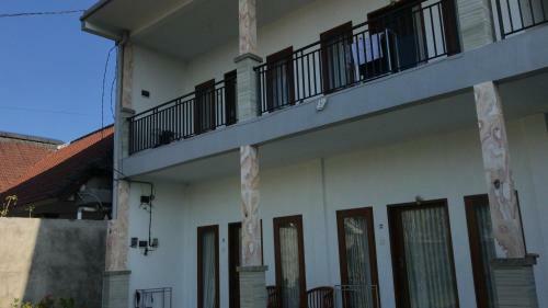 Apartamento Divayana Homestay