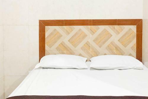 Hotel Rumah Kost Widia Grha Denpasar Redpartner
