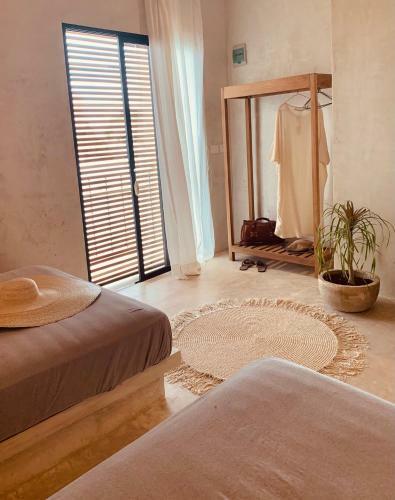 Madre Holbox Apartments & Suites