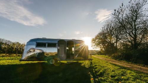Silver Airstream Glamping & Rental