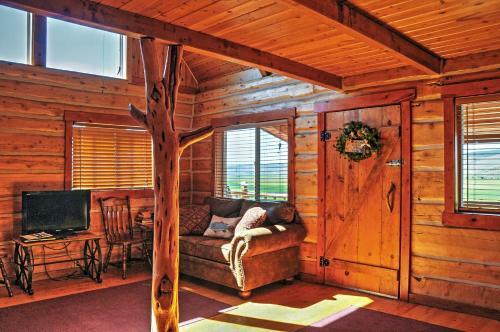 Remote Antimony Log Cabin With Green Meadow Views!