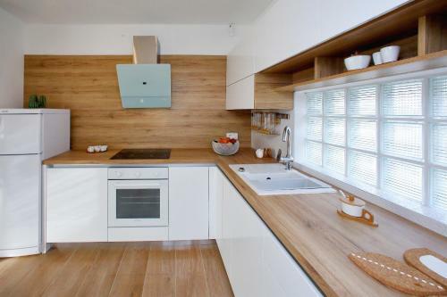 L Apartments