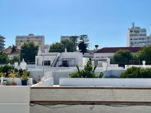 Moradia Central Olh�o - T2 P�tio Amplo
