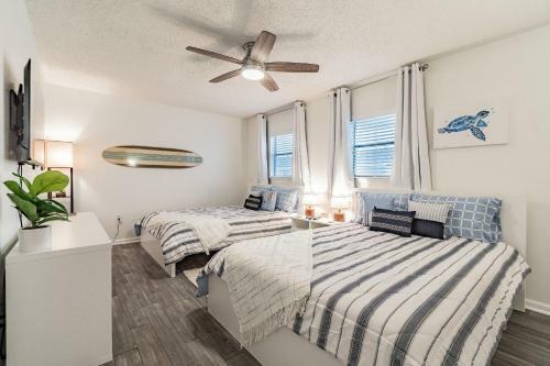 White Sand & Cool Waves Steps From Your Door!