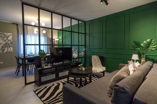 Apartamento The Green Wall House