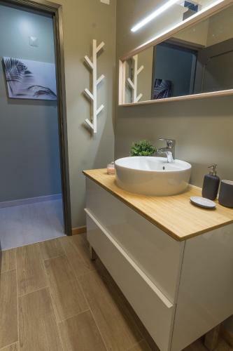Apartamento The Green Wall House