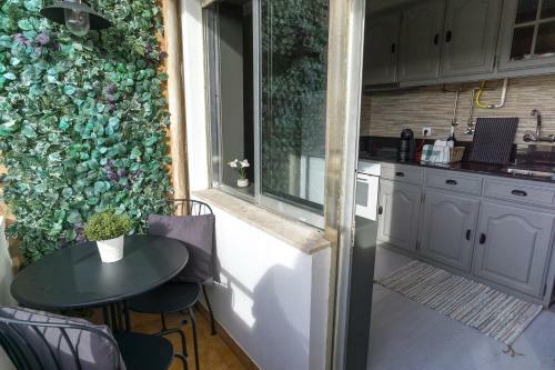 Apartamento The Green Wall House