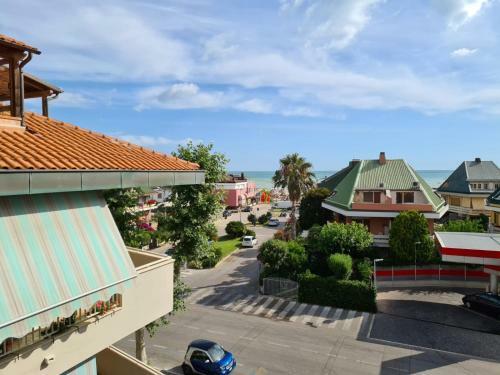 A Two Room Apartment With A Seaview