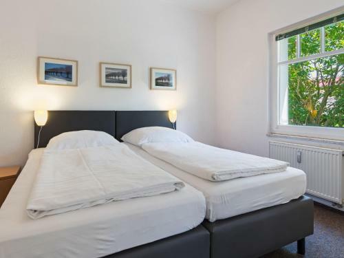 Garden-view Apartment In L�bow With Terrace