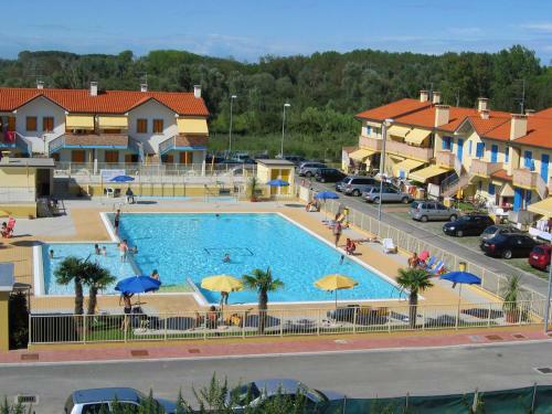 Delightful Holiday Home In Rosolina With A Shared Pool