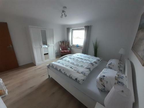 Apartamento Ferienwohnung Heimathafen Westensee