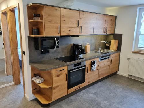 Apartamentos Ferienwohnung Zur Rh�n Tischlerei