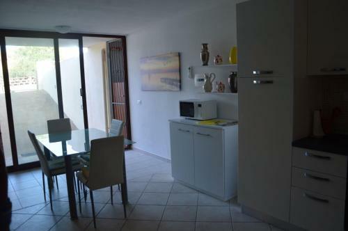 Apartamento Settemmezzu - Lu Bagnu