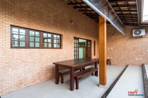 Casa Na Praia Grande Com Piscina Churrasqueira E Ar Condicionado